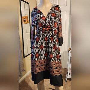 Elegant Black and Orange Patterned Dress